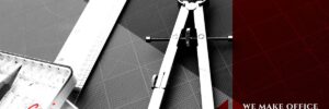 A metal compass, ruler, and drawing tools on a drafting mat; text reads, "We make office construction a dream come true.